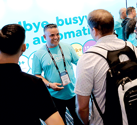 Image of people in a conference.